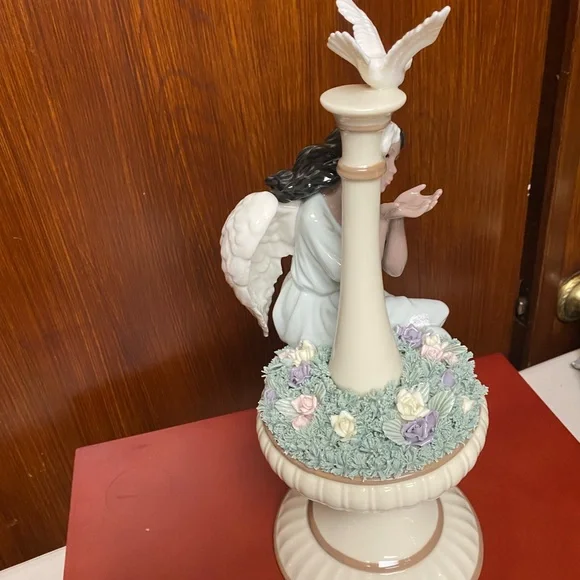 Grandeur Noel Porcelain Angel sculpture in fountain